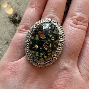 Large fashion ring. Blue with colorful flecks. Size 6.